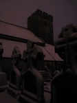 SX25897 Snow on celtic crosses OId St Illtud's Church Llantwit Major.jpg